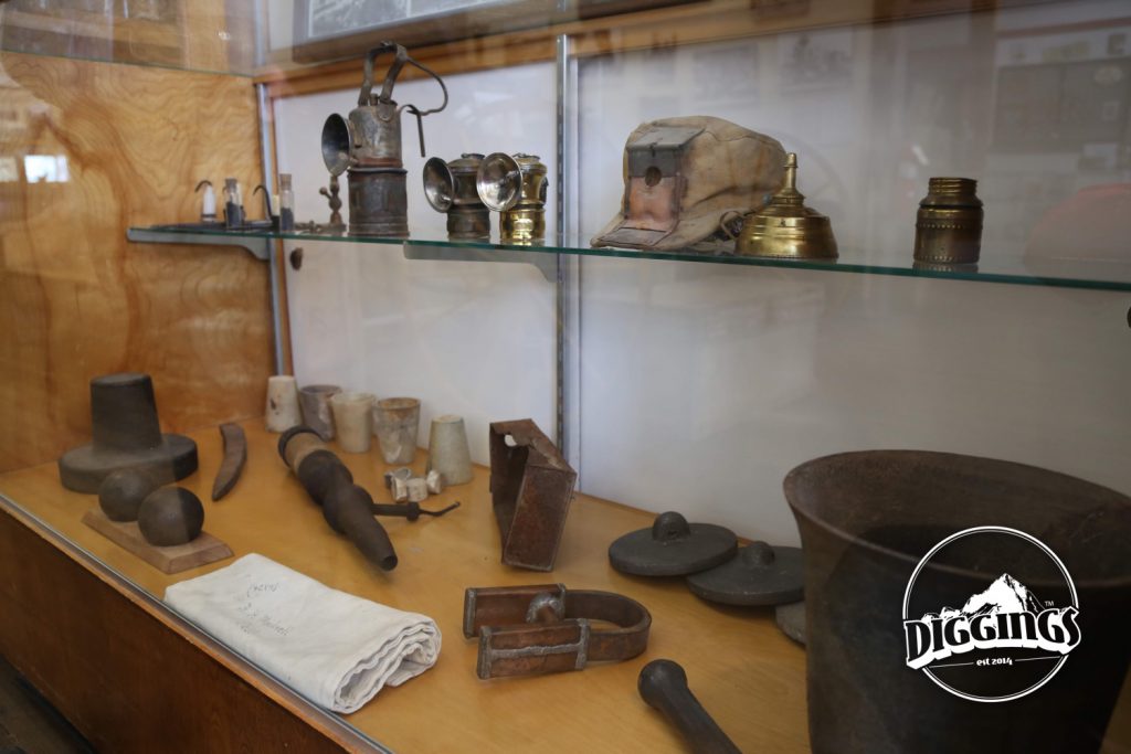 Assaying crucibles, lanterns, and assorted mining artifacts at the Sumpter Museum And Public Library